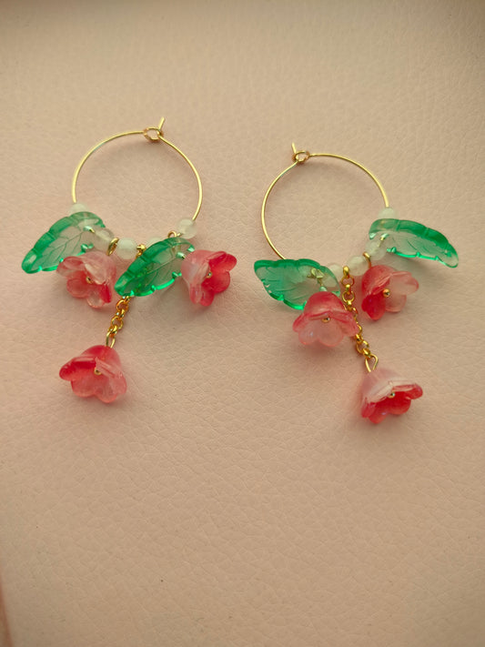 Isot lasikukka korvikset punaiset