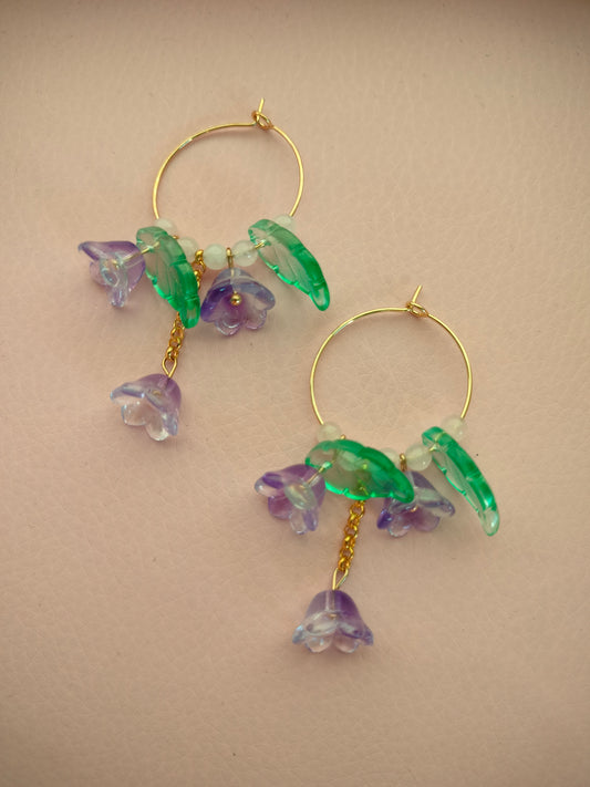 Isot lasikukka korvikset lilat